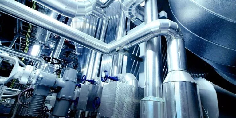 Chemical engineering concept: Pipes and valves in a vast industrial building Chemical engineering assignment help: Pipes and valves in a vast industrial building