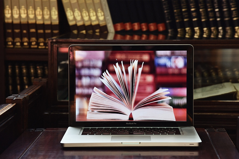 Engaging literature review analysis session on laptop literature review analysis tutoring session